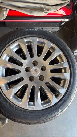235/50r18 Cadillac wheels and tires
