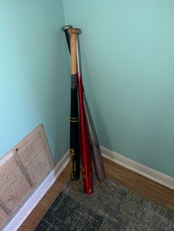 Random Softball bats yard sale