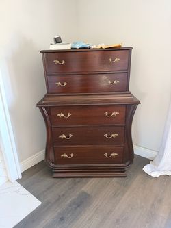 Antique highboy and headboard