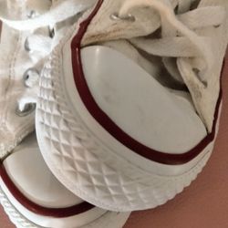 They Are White With The Red And Black Outline They Have A Little Bit Of Grip You Have To Tie The Shoe And The Brand Is Converse