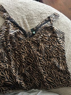 Woman’s 2xL fits like a Large
