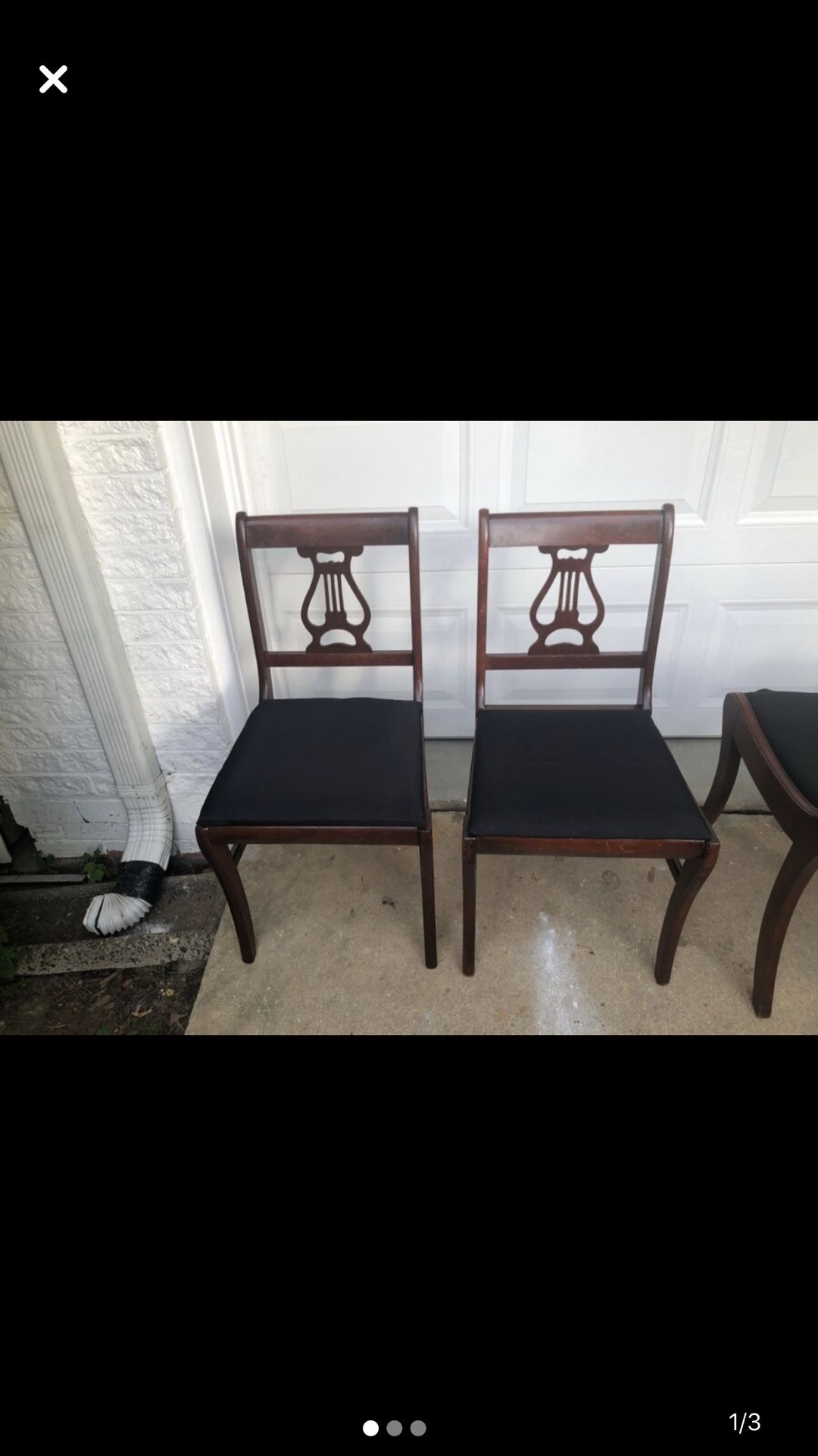 Two wooden antique chairs