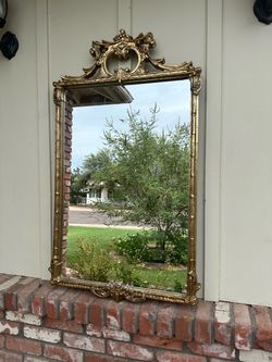 Ornate antique-style giltwood wall mirror