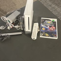 Wii console with Mario galaxy