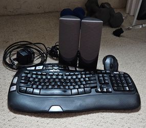 Keyboard with speakers and mouse
