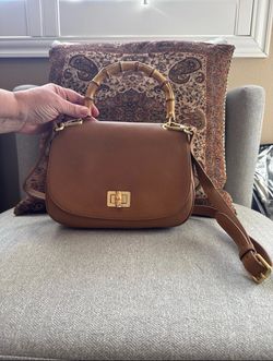 Brown leather cross body bag