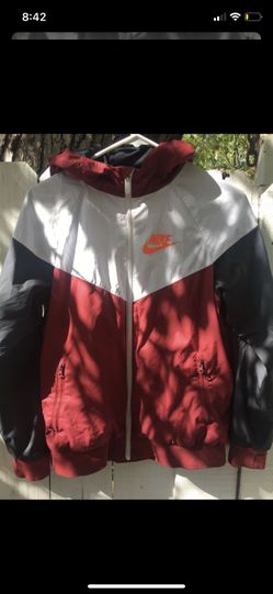 Nike windbreaker and Nike lunch bag
