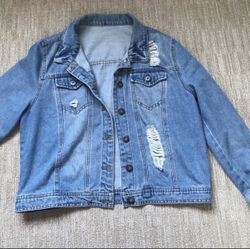 Woman’s distressed jean jacket