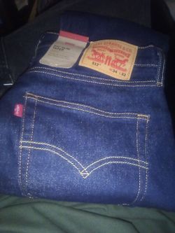 Levi jeans slim taper size 34/32