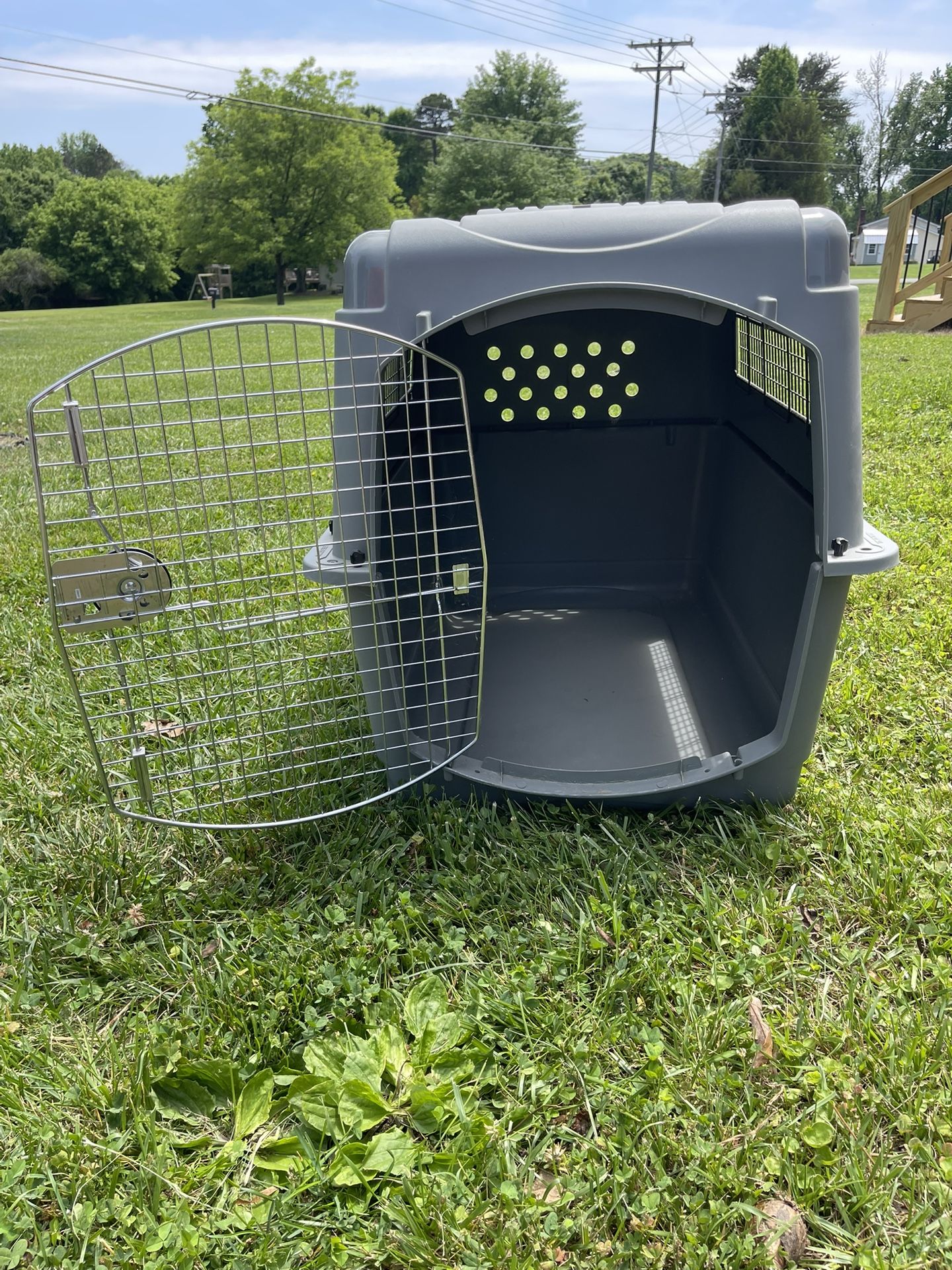 Two Giant Flight Kennels