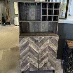 I’m Showing You A Wine Cabinet. It’s Brand New It Measures 62 1/2 Tall 15.5 Deep 31.5 With.