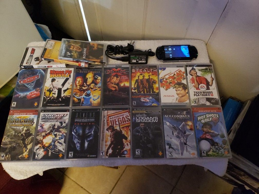 SONY PSP SLIM  2001  WITH 18 GAMES AND MOVIES AWESOME BUNDLE 