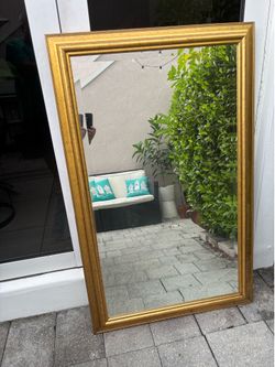 Large gold mirror