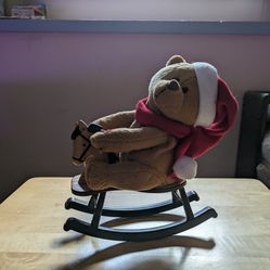 Musical Christmas Bear on Rocking Horse
