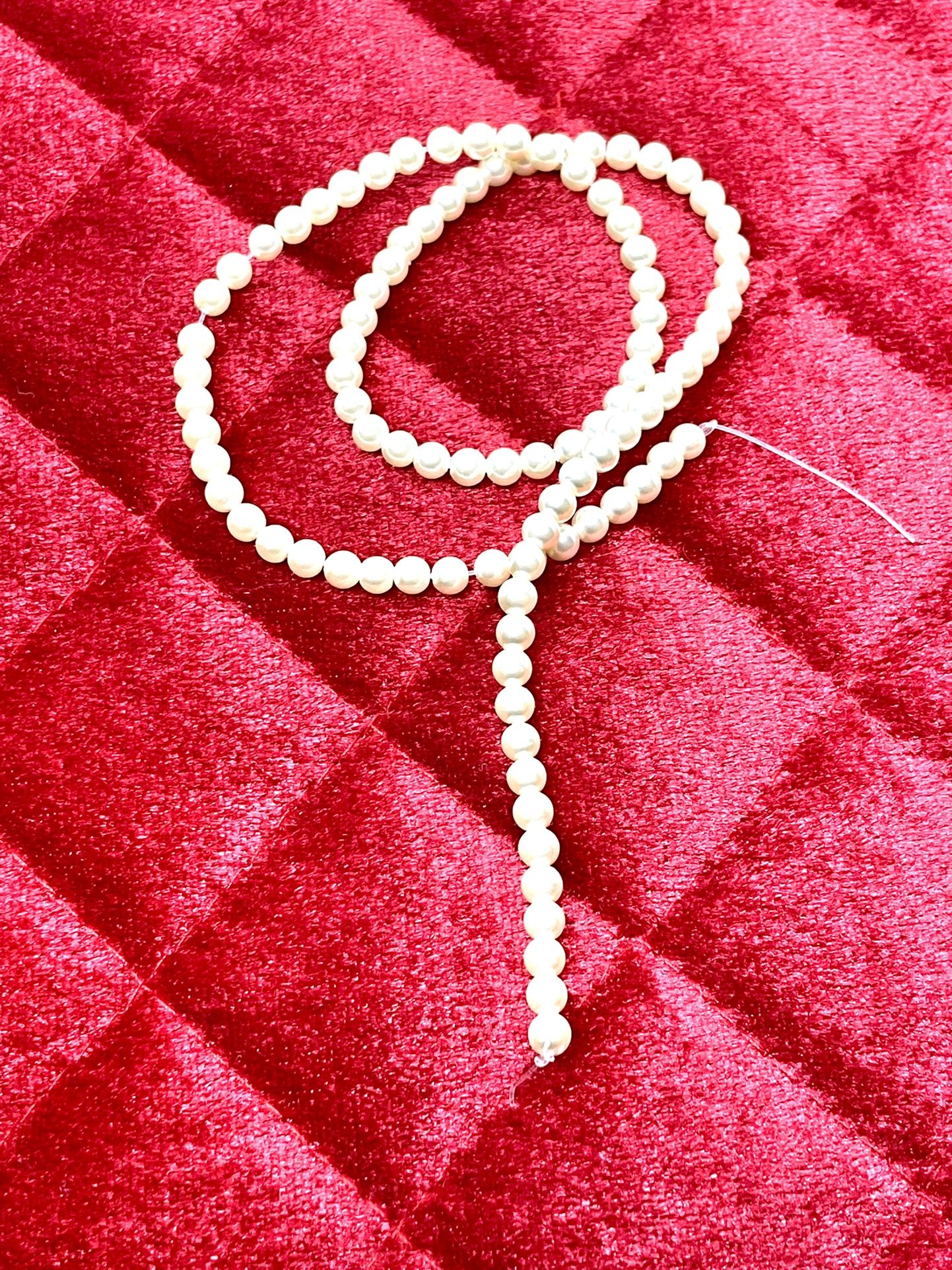 2 Strands Of Faux Pearls