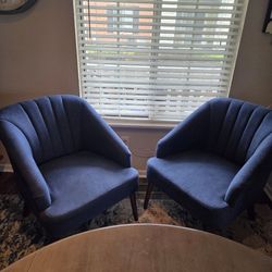 Upholstered blue chairs