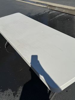 8 ft Lifetime table and chairs