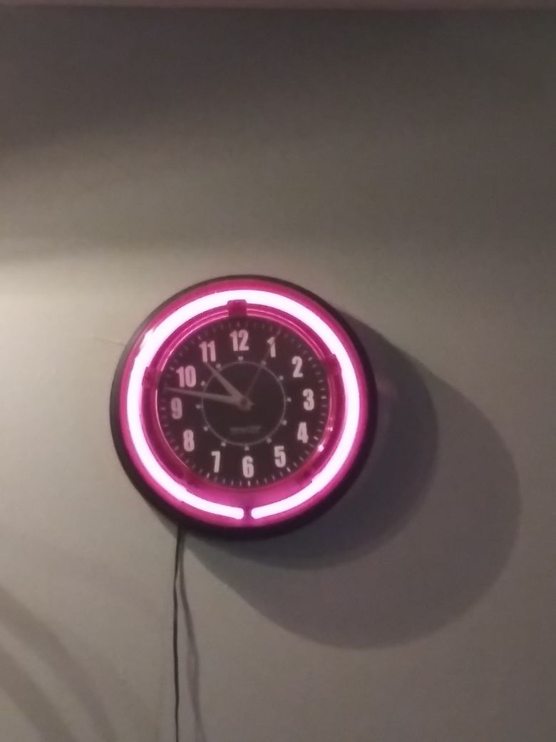 Pink neon wall clock