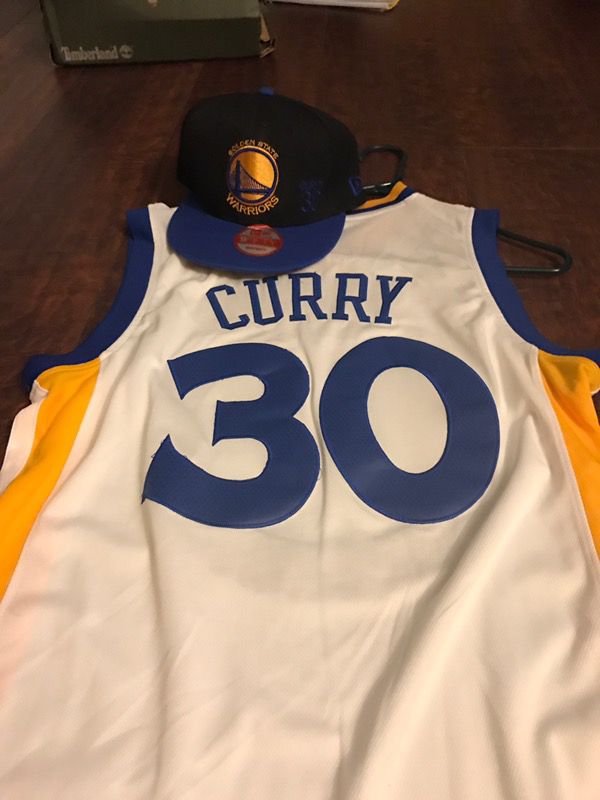 Brand new curry hat n jersey. Size small jersey snap back hat