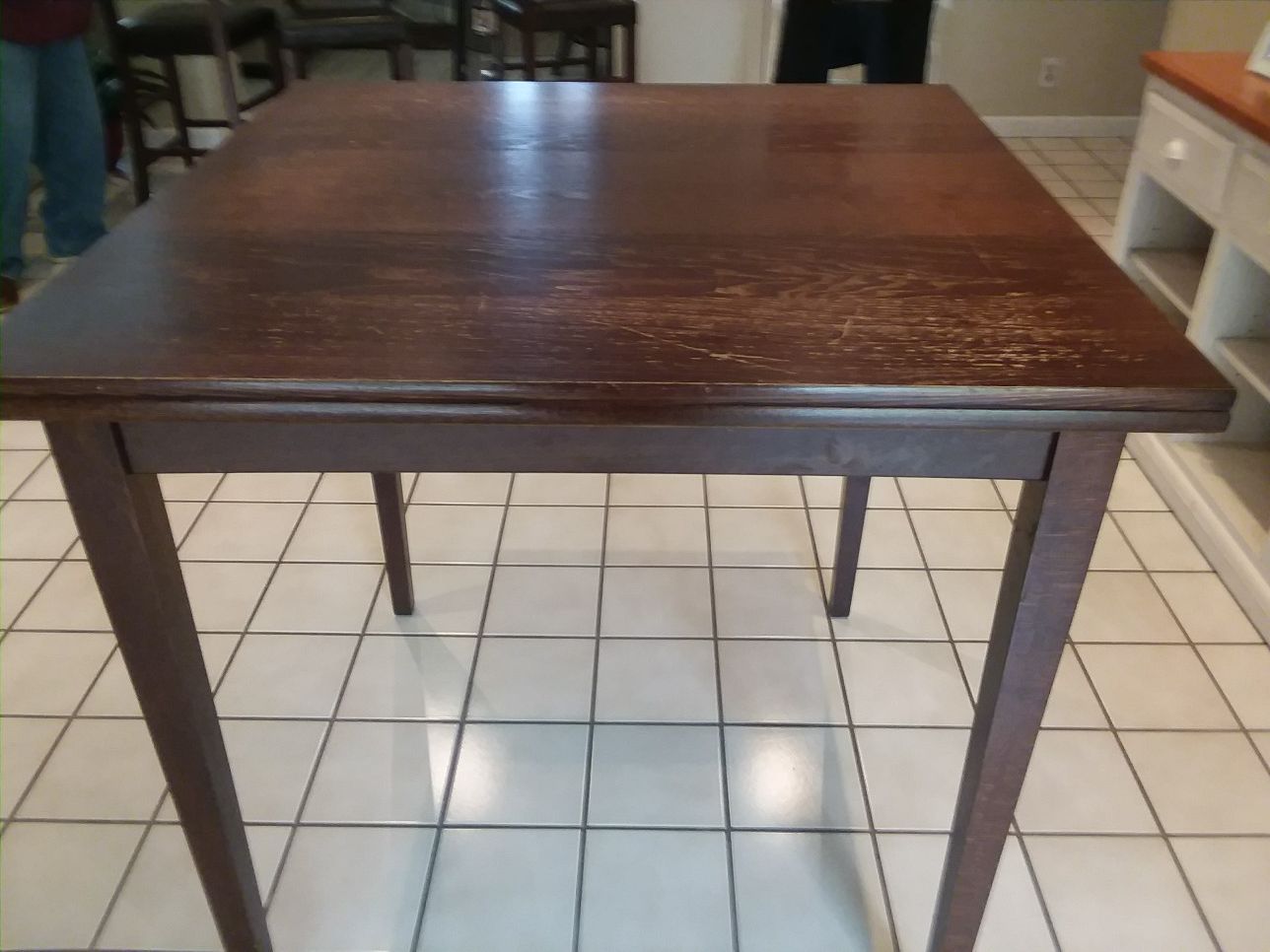 Pier One Pub Table. 3x3 extends to 5x3, height is 36. 10 years old, minor scratches.