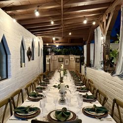 Plate Settings, Brown Crossback Chairs, Rectangular Table