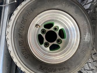 1 used Golf Cart aluminum rims and tire 18.5x8.5-8 rim 8x7