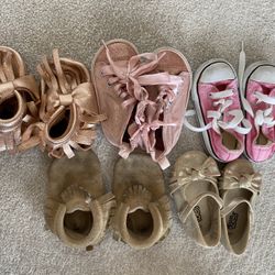 five pairs size five baby shoes