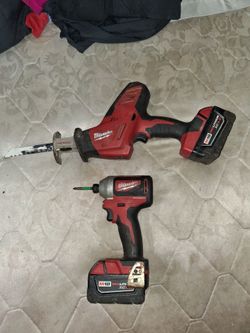 Two Milwaukee cordless tools