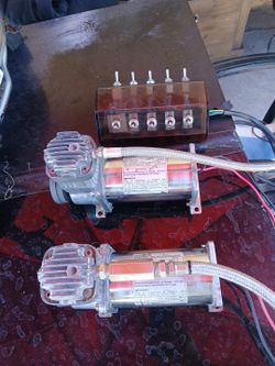 Two air compressors for hydraulics and switchboard