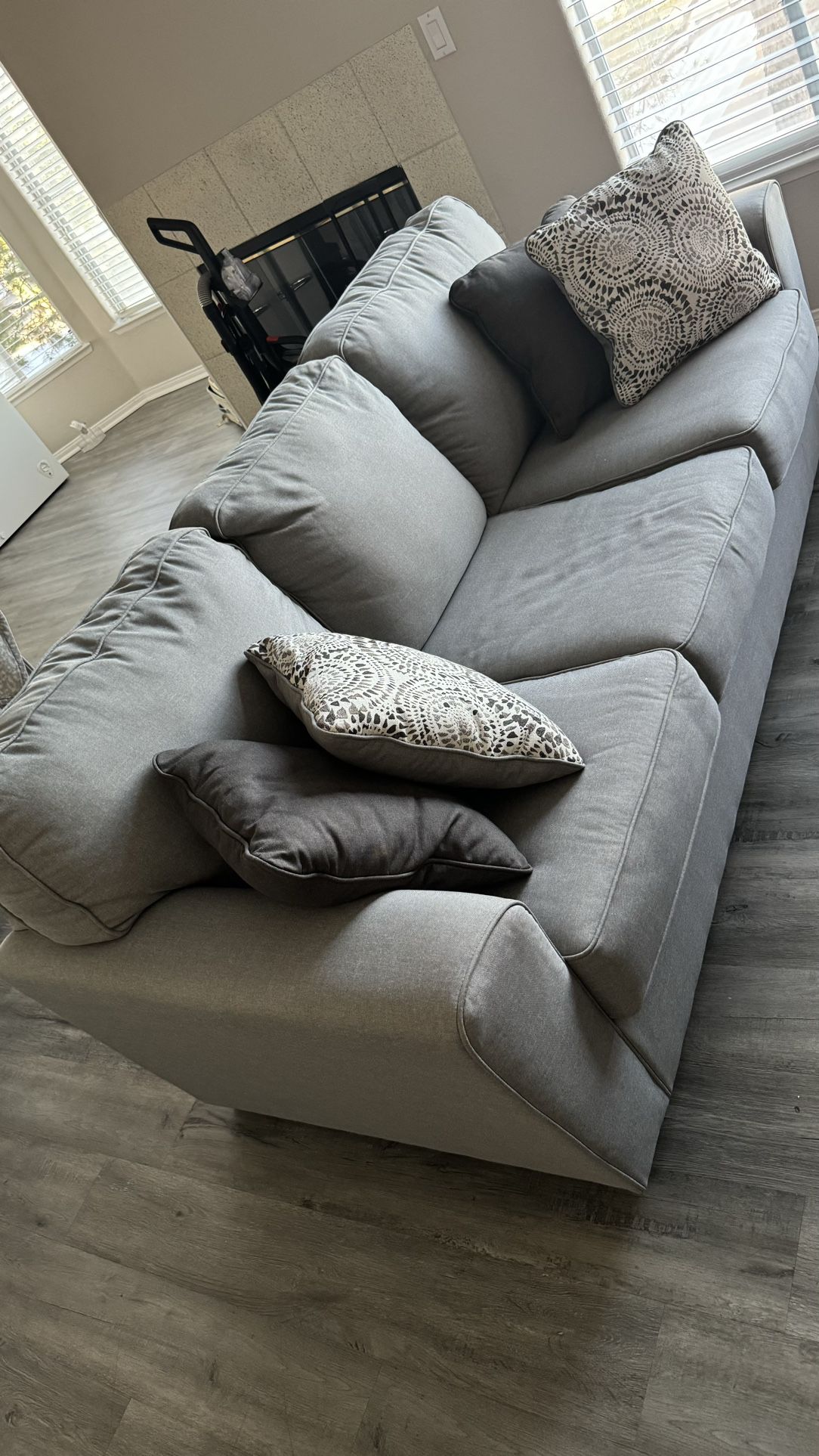 New sofa: gray three seater sofa