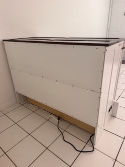folding cabinet bed (Murphy cube bed or credenza bed).