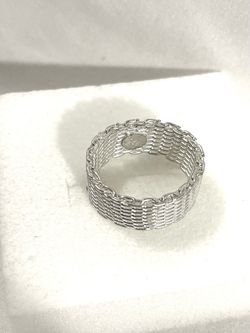 Brand new made in Italy .925 silver mesh band wedding ring. Size 7.