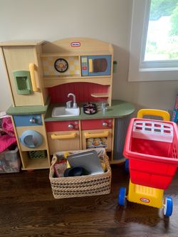 Adorable play kitchen, food, and shopping cart