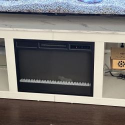 White Marble Tv Stand For Tvs up To 70” With A Fireplace And Electric Led