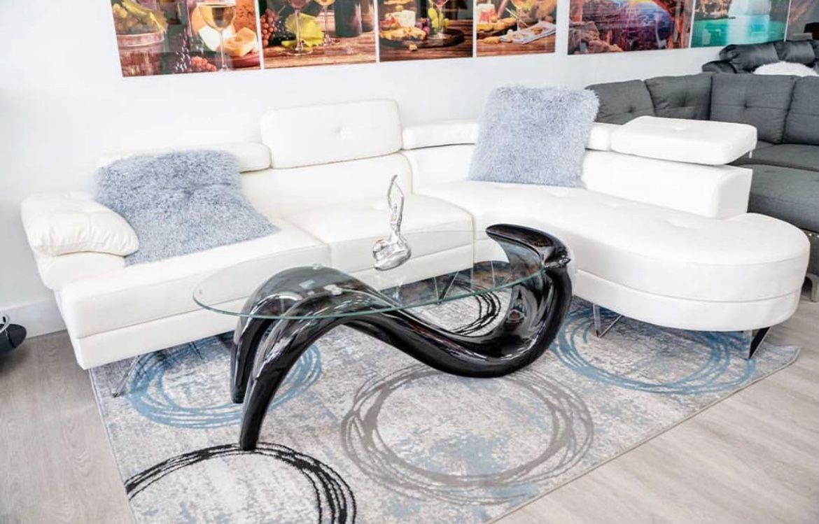 Modern White Leather Sectional Sofa with Glass Coffee Table
