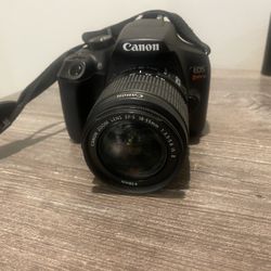 Canon Camera With Lens