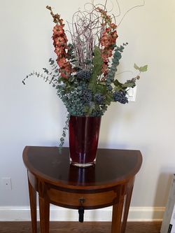 Red Crystal Vase with Floral Arrangement