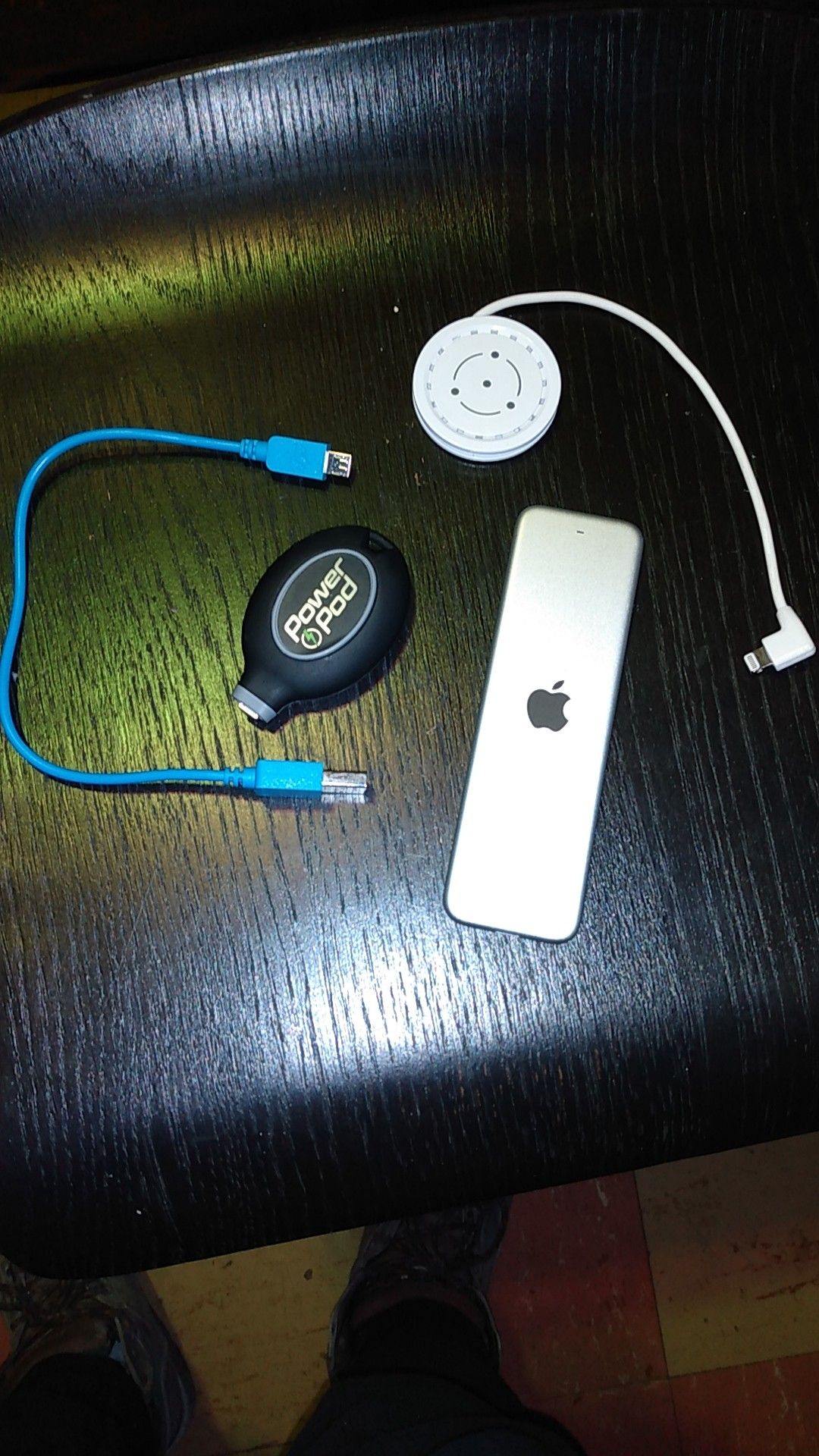 Apple computer remote and a iPhone portable charger which last 24 hrs