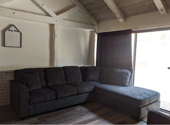 Dark blue sectional couch