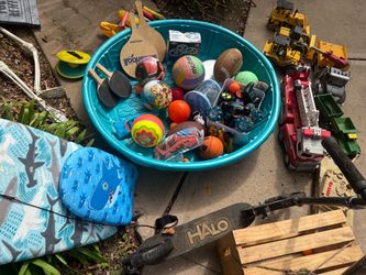 Outdoor toy lot (trucks, scooters, remote control cars, balls galore)