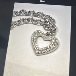 100% Auth. Swarovski Crystal Hearts Bracelet. $30.00