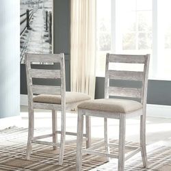 New Signature Design by Ashley Skempton 24" Counter Height Upholstered Barstool, Set of 2, Antique White