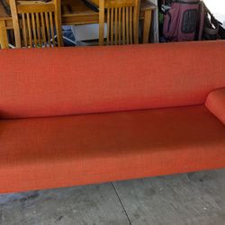 Red IKEA Futon Couch