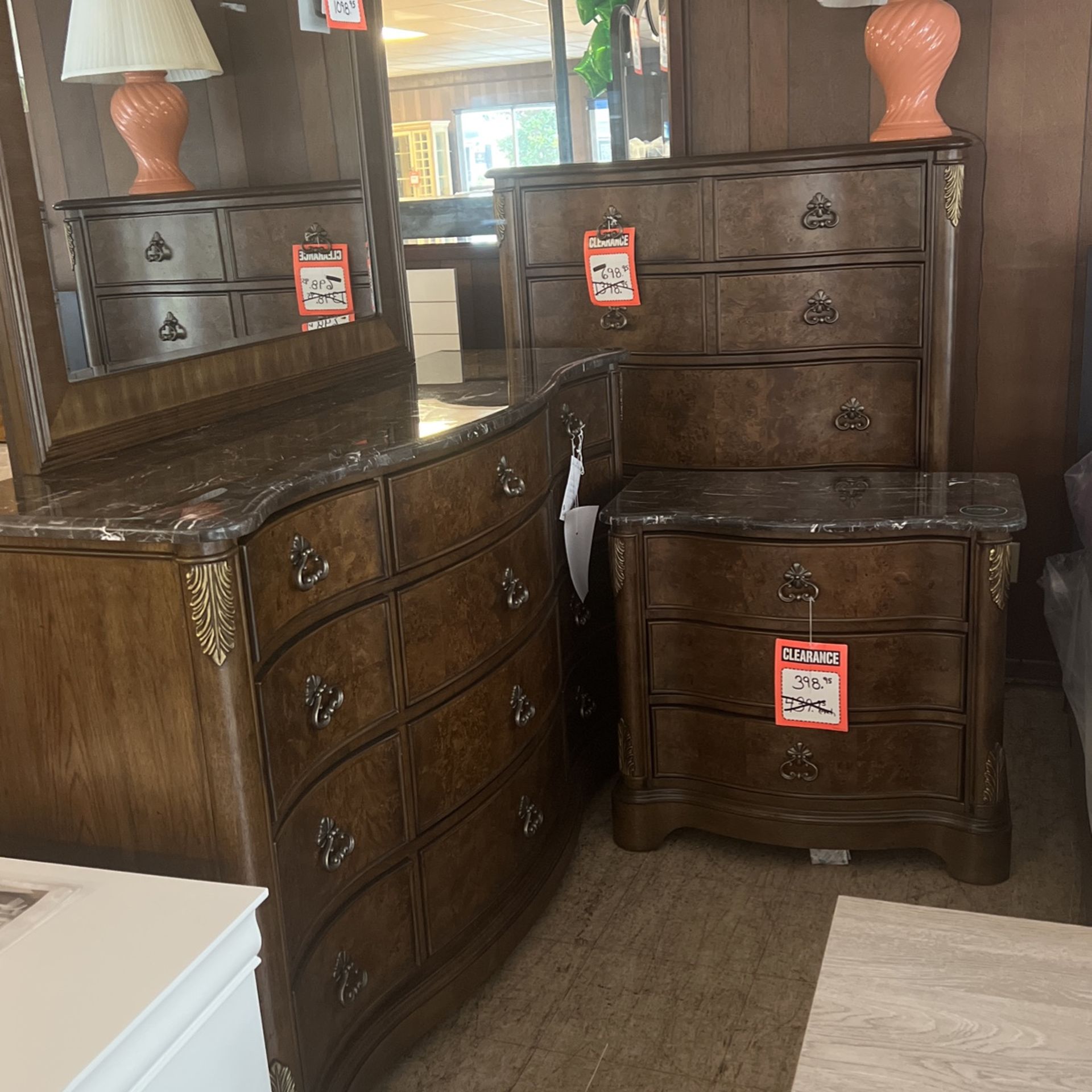 Nightstand $398 chess $698 dresser and mirror $1098 close out prices all firm