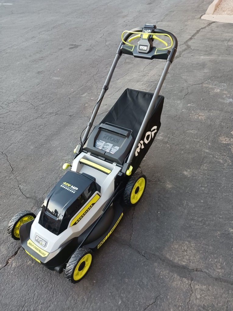 Ryobi 40 Volt HP Brushless Self-propelled Lawn Mower Including Battery And Charger. New