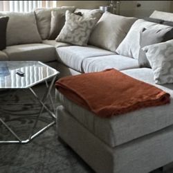 Couches with pillows and Coffee table