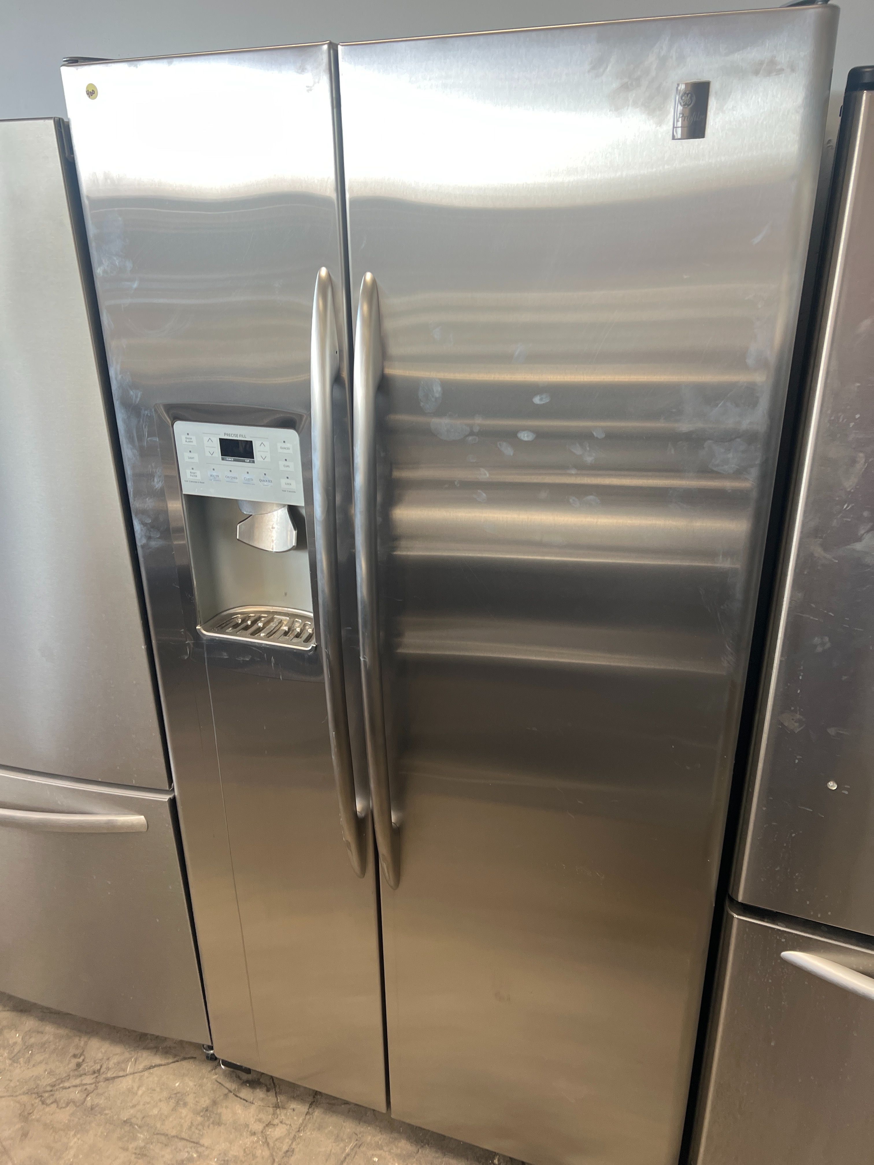 GE STAINLESS STEEL SIDE BY SIDE REFRIGERATOR -FREE DELIVERY
