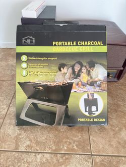 Portable charcoal grill