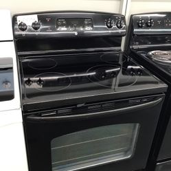 GE 4 Burner Glass Top Range. 1 year Warranty 