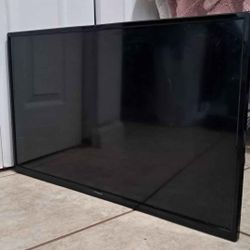 NOT FREE..Polaroid 32 inch Flat Tv (Needs Remote)
